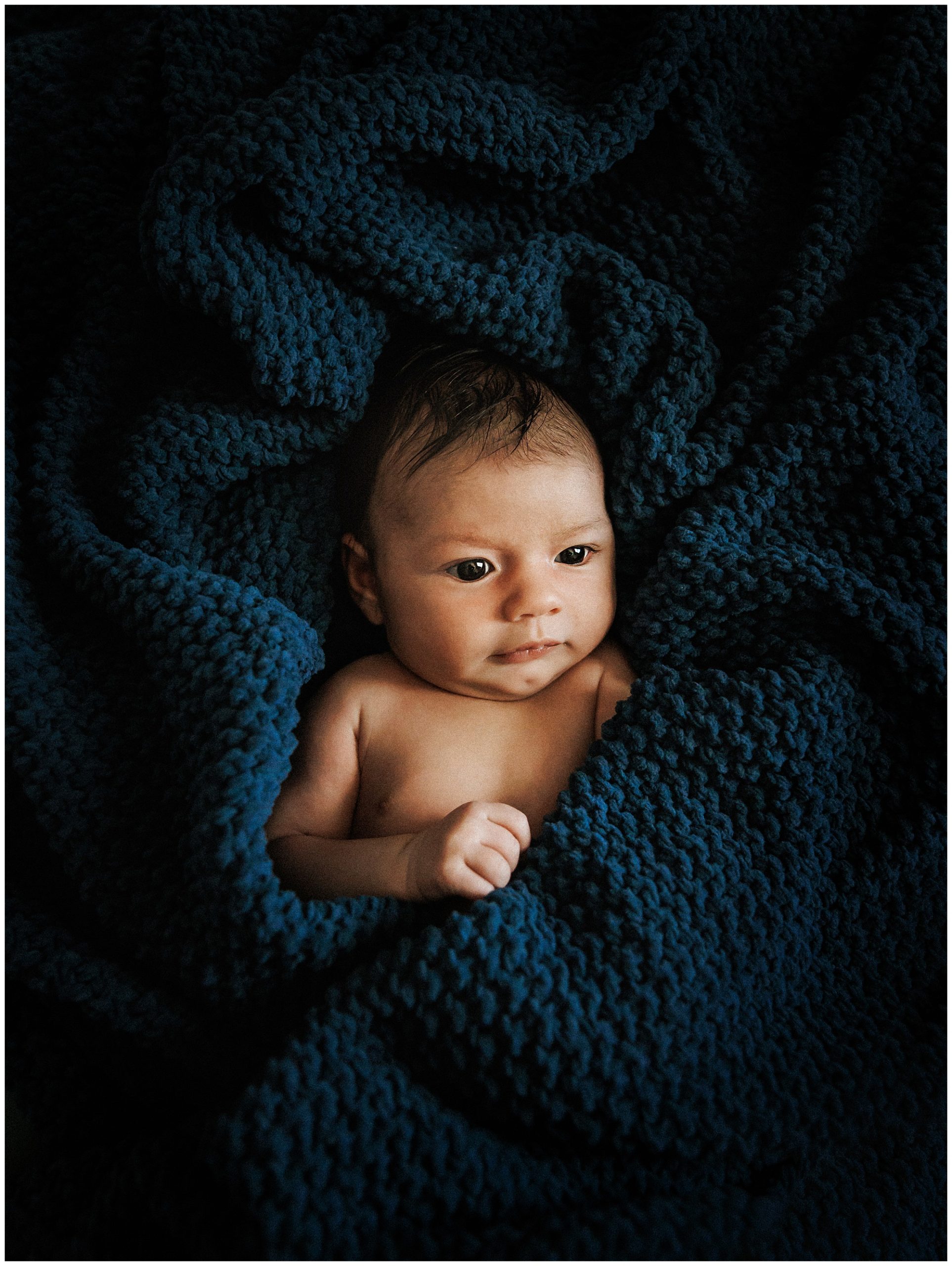 Photograph of newborn baby boy from lifestyle newborn session in Murfreesboro TN