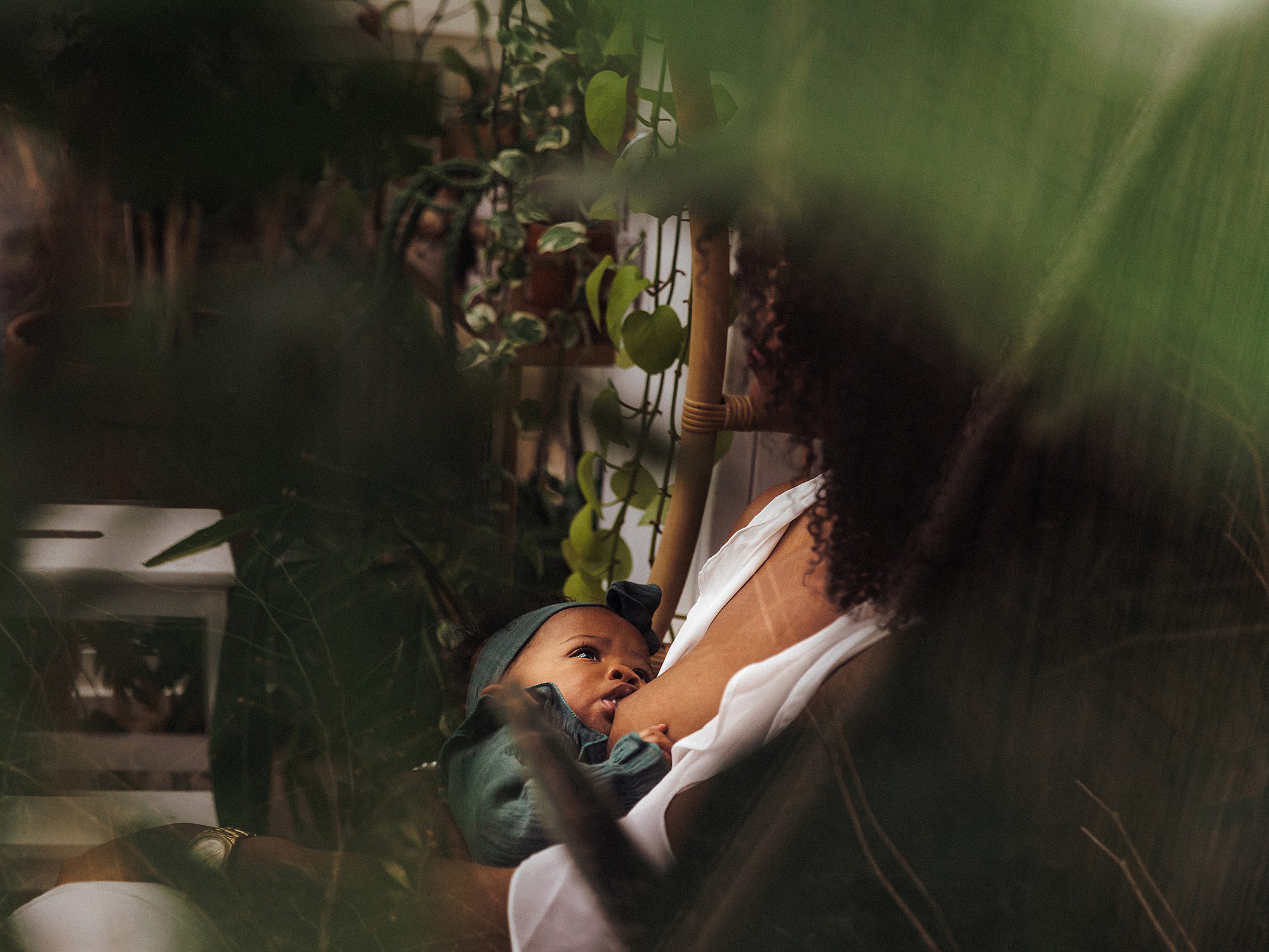 Portrait of mother nursing baby - breastfeeding photography nashville - east nash greenhouse