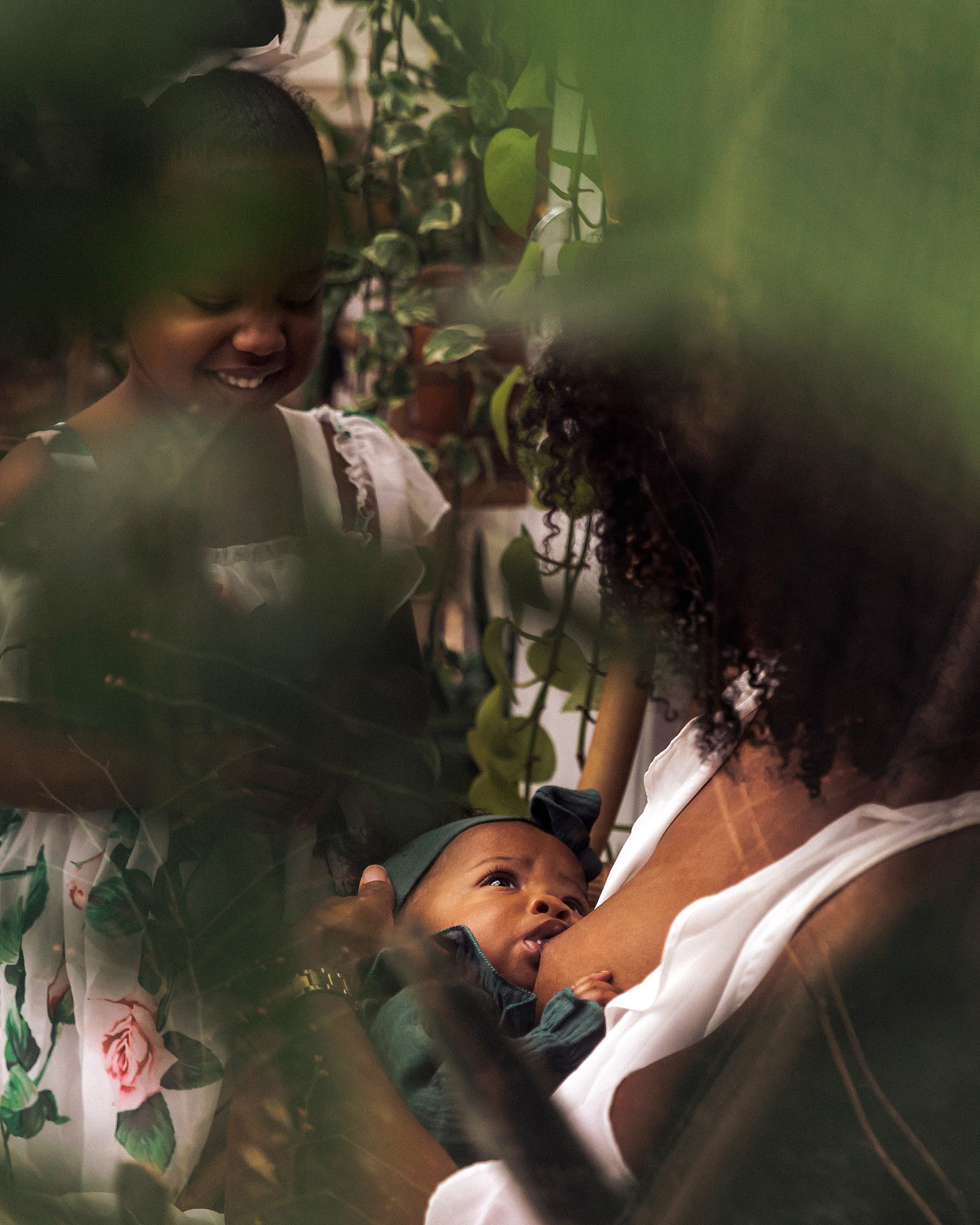 Portrait of mother nursing baby - breastfeeding photography nashville - east nash greenhouse