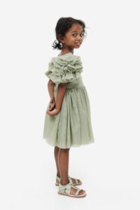 Product Photograph of outfits for spring pictures - photograph of Little girl wearing a sage green tulle dress