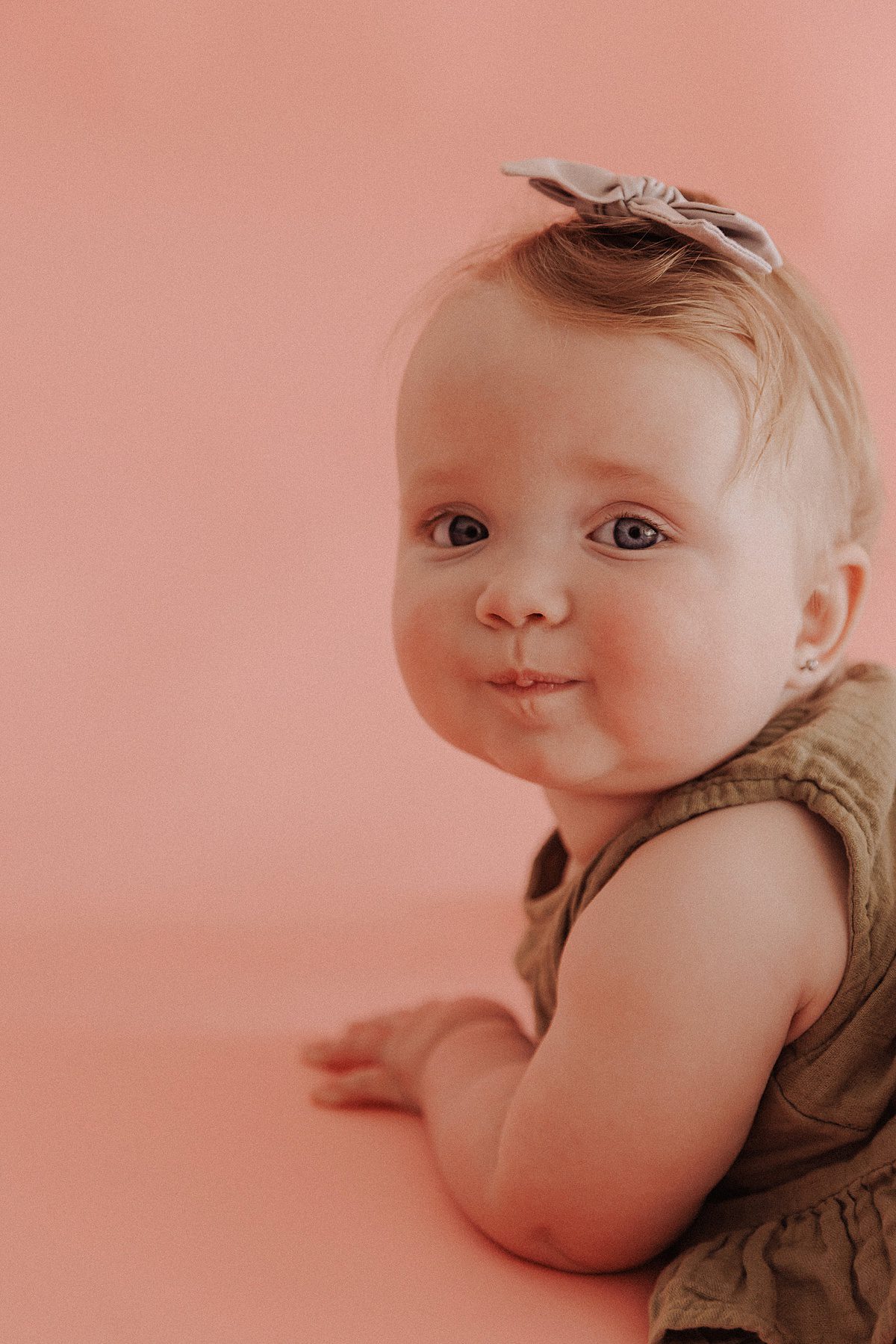 Baby on a pink background