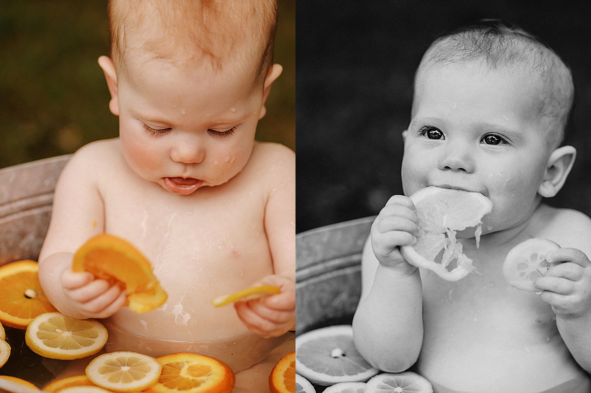 Baby sits in a bucket with fruit